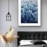 Framed ‘Deep Blue Sea’ in a serene bedroom, featuring abstract ocean waves and foam to enhance relaxation.