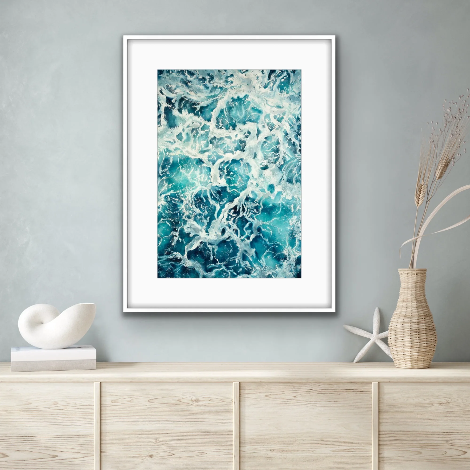 'My Heart Belongs to the Sea' beautifully framed in a coastal-style living room, surrounded by natural textures and soft white accents, enhancing the serene seaside ambiance.