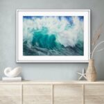 Framed ‘Softness’ watercolor seascape painting in a coastal home, enhancing the serene nautical decor with a peaceful ocean wave.