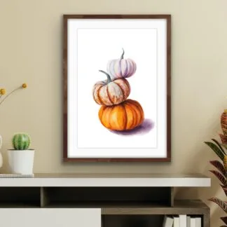 Stacked pumpkins watercolor art print as the centerpiece of a living room's seasonal decor, embracing fall tones.