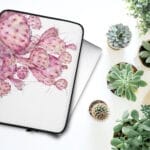 Stylish laptop case featuring a soft pastel pink opuntia cactus watercolor painting, perfect for nature lovers and botanical decor enthusiasts.