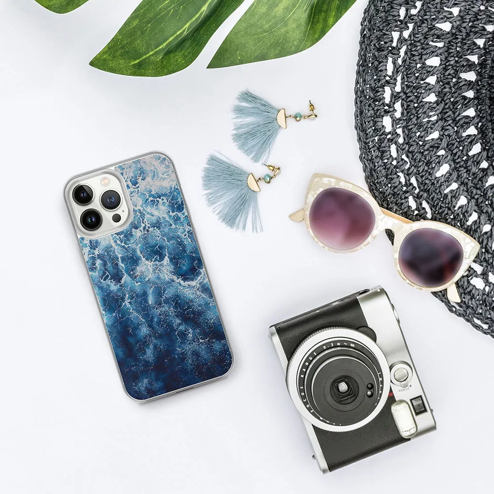 Modern iPhone case featuring abstract ocean waves from ‘Deep Blue Sea,’ adding a vibrant coastal aesthetic.