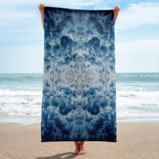 Beach Towel with a print of the abstract navy blue ocean water