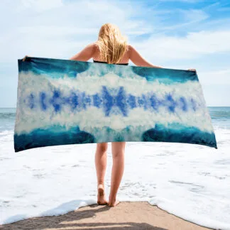 Beach Towel with a print of the bright blue ocean wave “Through the light”.
