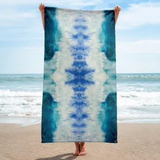 Beach Towel with a print of the bright blue ocean wave “Through the light”.