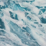 Close-up of ocean wave in soft blue hues, highlighting the tranquility of the watercolor seascape.