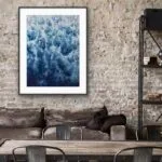 ‘Deep Blue Sea’ painting displayed in a loft designed living room, with abstract waves and foam adding depth to decor.