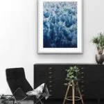 Framed ‘Deep Blue Sea’ above a shelf in a living room, creating an ocean-inspired ambiance with foam details.