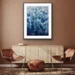 Framed ‘Deep Blue Sea’ seascape in a coastal home, bringing abstract ocean waves and foam to the living room.