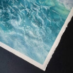 Artist Kateryna Nazarenko’s signature on the corner of ‘Storm,’ a dramatic watercolor seascape.