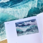 Exhibited in Spain, ‘Storm’ is a standout piece in Kateryna Nazarenko’s collection. The accompanying catalogue highlights this vibrant watercolor painting, where bold brushstrokes and deep blue tones capture the essence of a turbulent ocean.