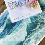 ‘Storm’ by Kateryna Nazarenko displayed at the Exhibition catalogue. This original watercolor seascape captivates with its dynamic depiction of powerful ocean waves, showcasing the artist’s mastery in expressing nature’s raw energy.