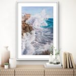 ‘Breaking Wave’ painting in a coastal home, displayed above a wooden commode for marine-themed decor. wave