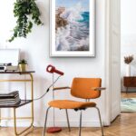 Framed ‘Breaking Wave’ displayed in a calming home office with oceanic decor accents.