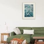 Framed 'My Heart Belongs to the Sea' in a bright, airy living room, complementing coastal decor.