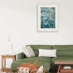 Framed 'My Heart Belongs to the Sea' in a bright, airy living room, complementing coastal decor.