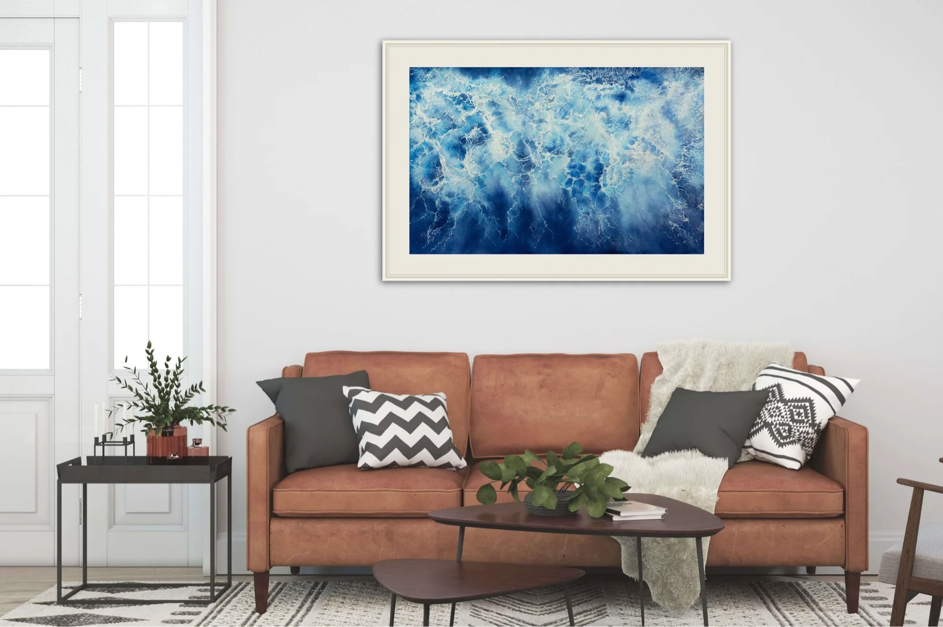 Tranquil blue seascape 'Ocean Blues' in a coastal-themed living room with neutral tones.