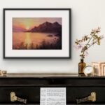 This Corsican seascape hung on the wall, capturing the beauty of a Mediterranean sunset.