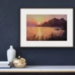 Elegant framed artwork Sunset on the Corsica coast - displayed in a living room, enriching the ambiance with its sunset tones and tranquil coastal vibes.
