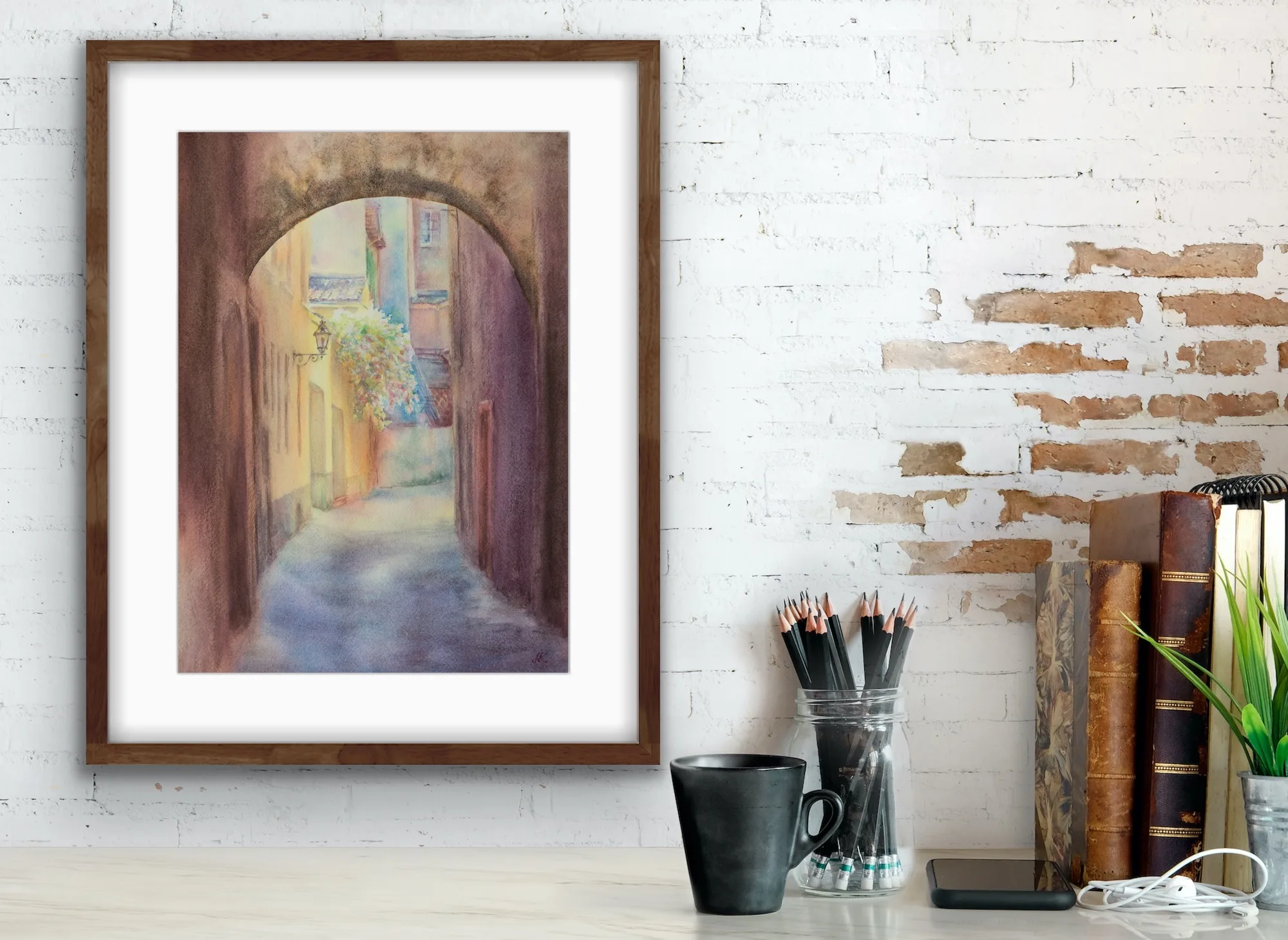 Displayed on the wall, this watercolor cityscape of Bologna evokes the peacefulness of early morning in an architectural masterpiece.