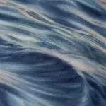 Close-up of soft grays and muted blues blending in "Evening Mood," showcasing the tranquil movement and depth of the ocean's surface