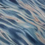 Close-up of the soft blending of muted blues and grays in 'Evening Mood,' capturing the fluid and tranquil nature of the ocean's surface.