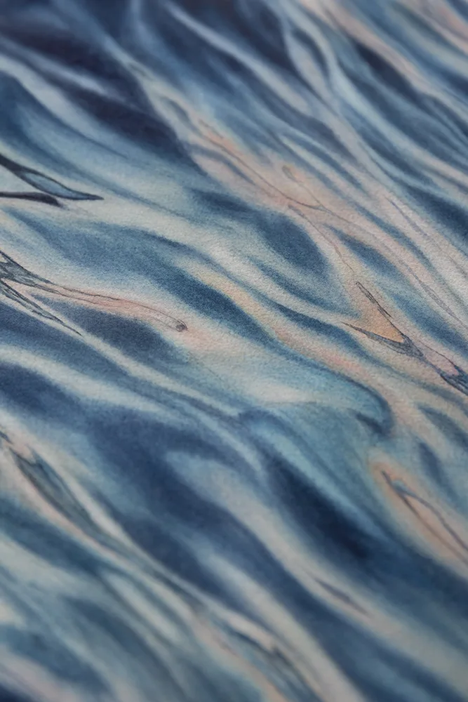 Close-up of the soft blending of muted blues and grays in 'Evening Mood,' capturing the fluid and tranquil nature of the ocean's surface.
