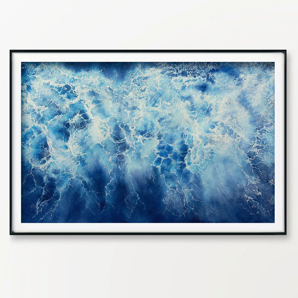 Framed 'Ocean Blues' watercolor painting by Kateryna Nazarenko, showcasing abstract ocean waves and soft foam textures in calming blue shades, perfect for coastal-inspired decor.