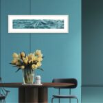 ‘Sparkles on Turquoise Water’ framed in a modern dining room, adding a serene ocean-inspired atmosphere to the space with its calming turquoise tones.
