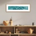 'Sparkles on Turquoise Water' framed in an art space, showcasing the calming essence of the sea in a room.