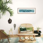 'Sparkles on Turquoise Water' framed in a nature inspired room, offering a serene and peaceful atmosphere perfect for gatherings.