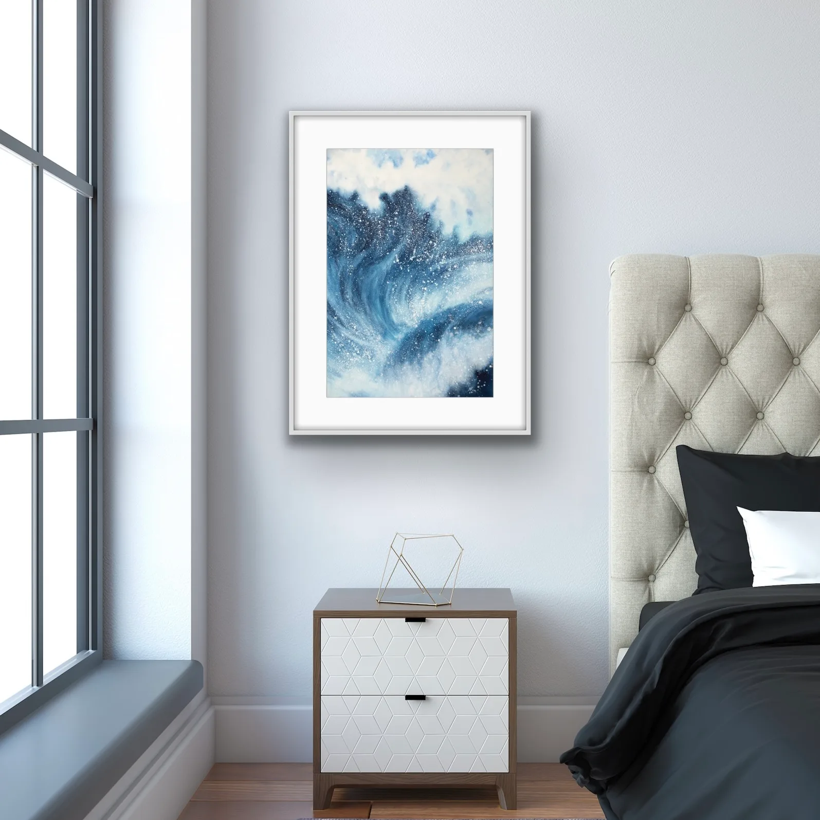 Framed ‘Night Wave’ in a serene bedroom setting, creating a bold contrast against neutral decor with its deep, energetic ocean waves.