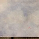 Detail of the artist’s signature on ‘Storm in Saint-Malo,’ displayed in the corner of the watercolor painting, authenticating the artwork by Kateryna Nazarenko.