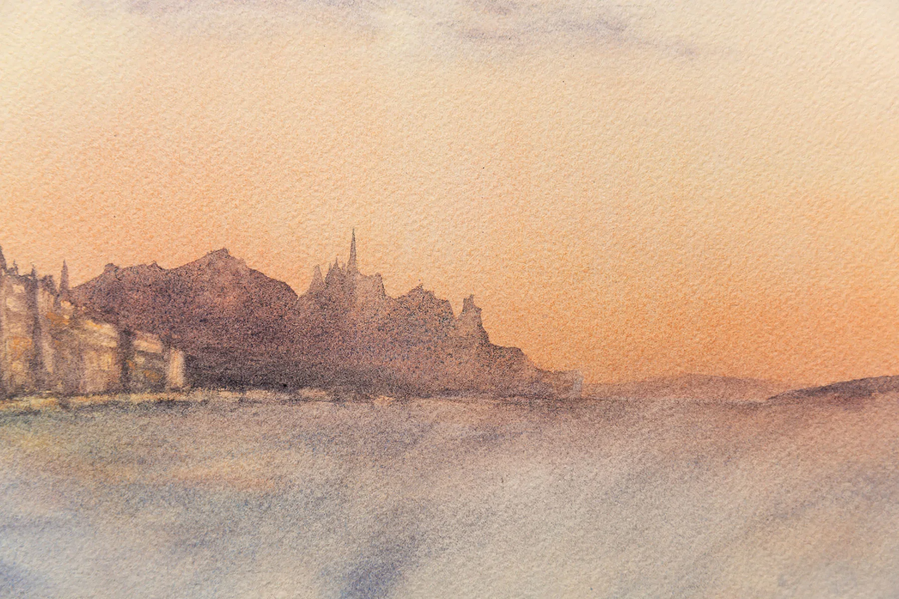 Close-up of the cityscape of Saint-Malo in ‘Storm in Saint-Malo,’ showing the quaint coastal buildings along the waterfront with the stormy ocean and vibrant sunset in the background.