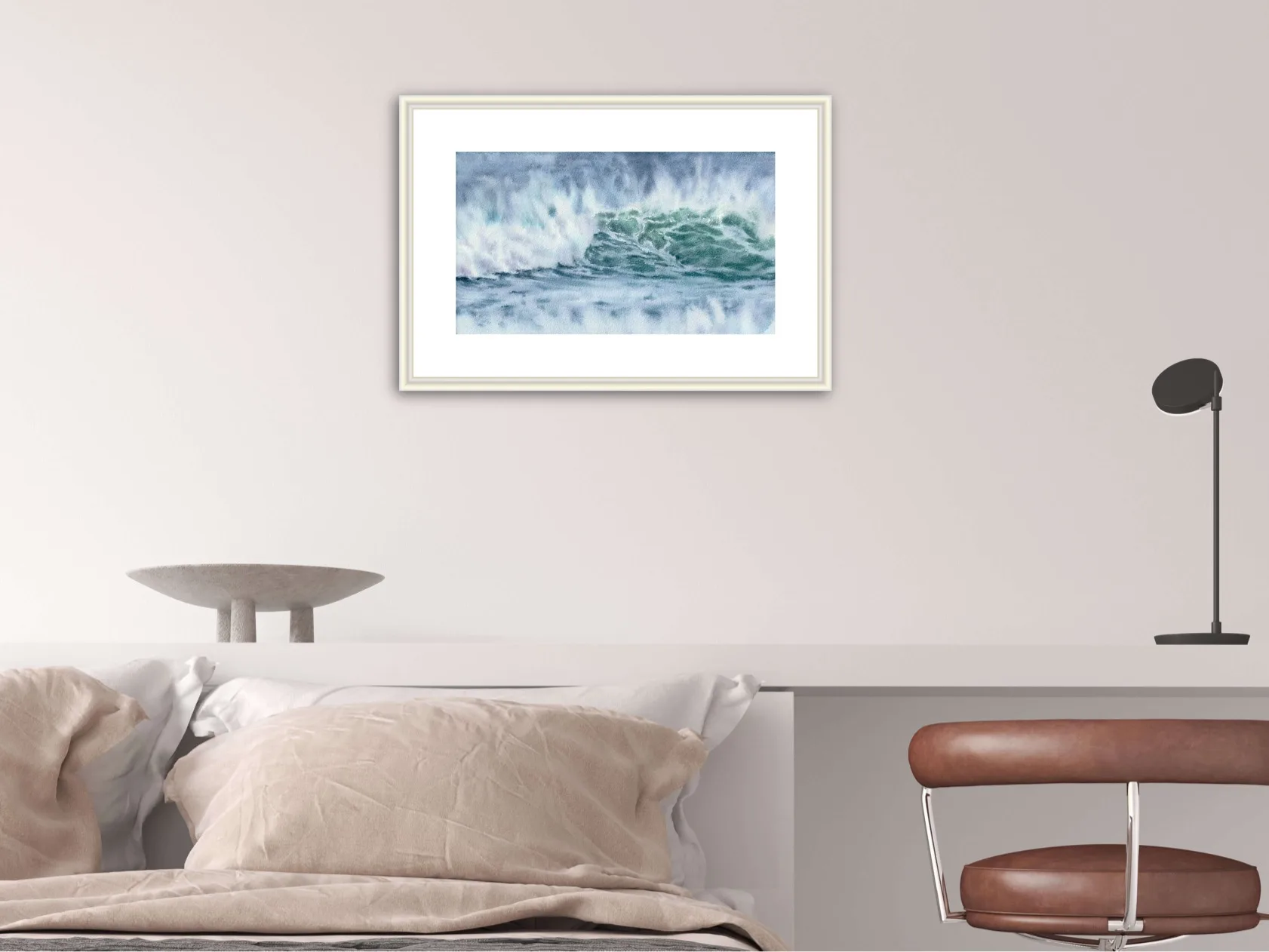 Framed ‘Coastal Wave’ in a cozy bedroom, capturing the calming energy of crashing waves on the beach with rich watercolor hues.