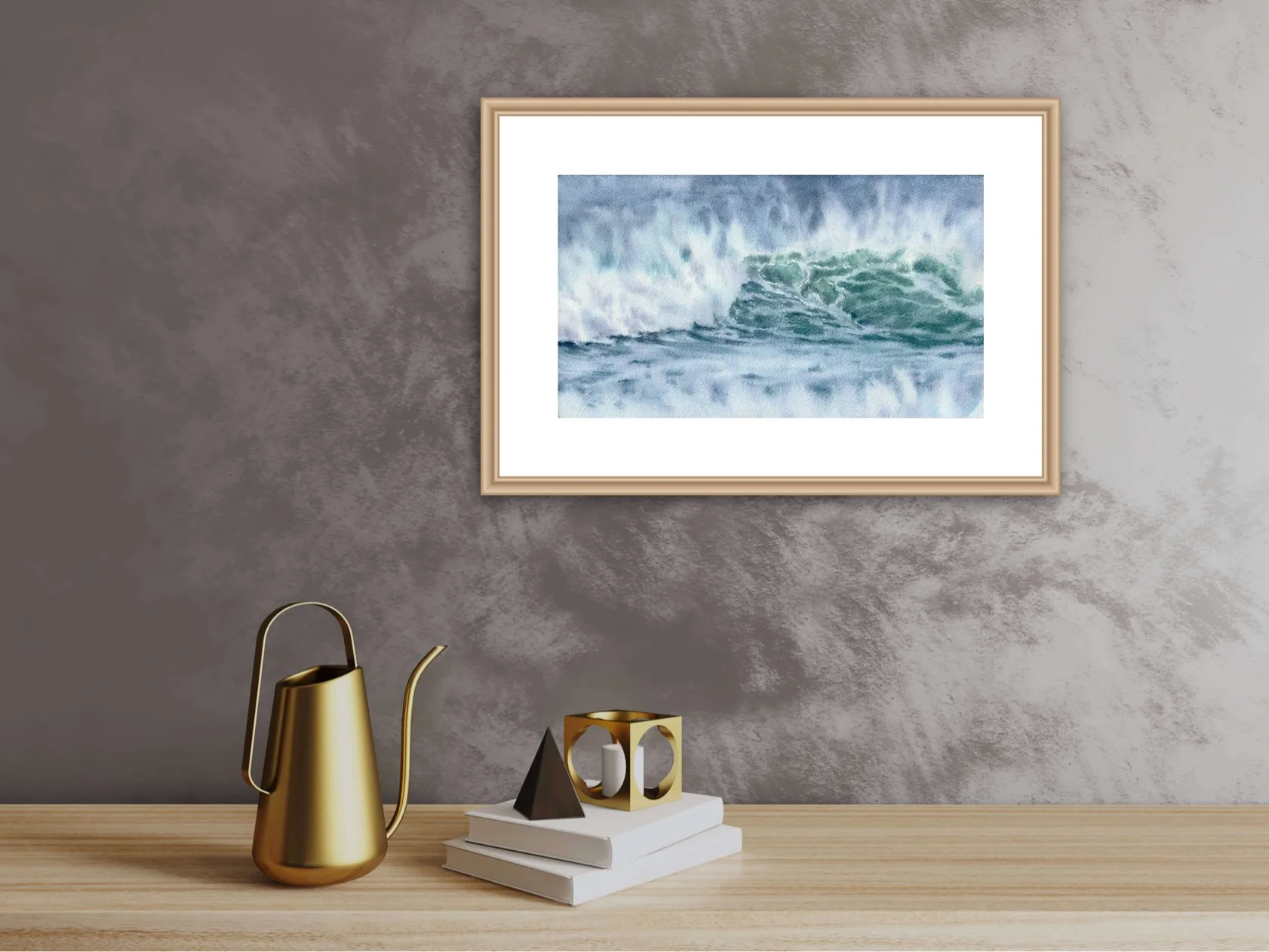 ‘Coastal Wave’ framed on the wall of a minimalist living room, offering a serene and dynamic beach scene in soothing blues and greens.
