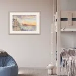 Elegant framed depiction of Saint-Malo’s rugged coastline, with a dramatic sky and powerful ocean waves.