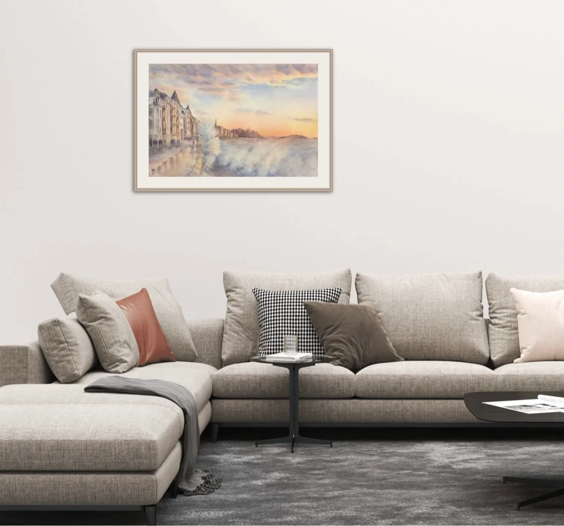 Framed painting of Saint-Malo, with crashing waves and a beautiful sunset captured in soft pastels and rich blues.