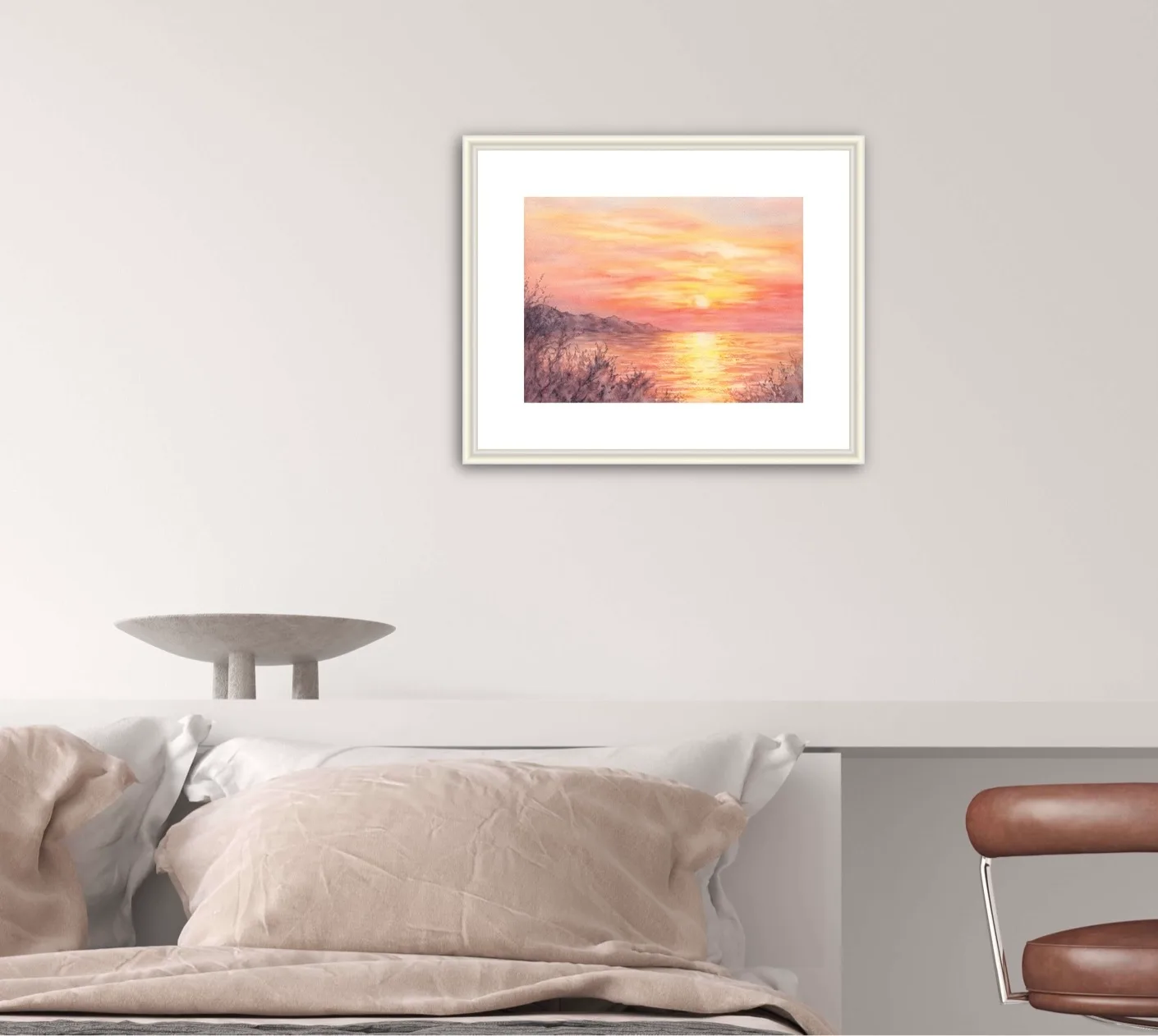 Framed ‘Golden Sunset’ in a cozy bedroom, creating a tranquil ambiance with its glowing sunset over the ocean.