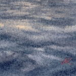 Kateryna Nazarenko’s signature on ‘Sunset by the Sea,’ located discreetly in the corner of the painting.
