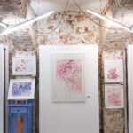 Pink Opuntia Cactus watercolor painting displayed on an exhibition wall, showcasing its soft pastel tones and delicate botanical details, adding elegance and tranquility to the art space.
