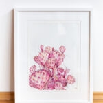 Pink Opuntia Cactus watercolor painting framed in a simple, modern frame, bringing a fresh botanical touch to any interior decor with its delicate pastel tones and intricate details.