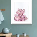 Pink Opuntia cactus watercolor painting framed in a kitchen, bringing a serene and delicate botanical touch to the space with its soft pastel tones and intricate details.