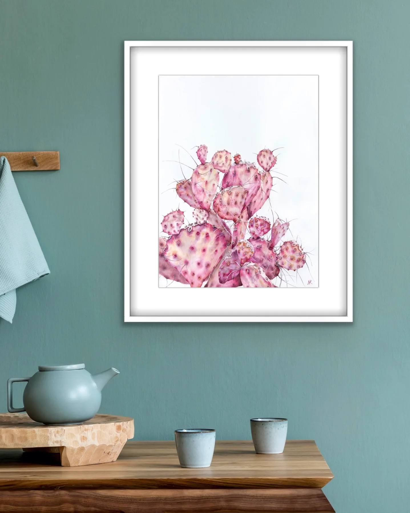 Pink Opuntia cactus watercolor painting framed in a kitchen, bringing a serene and delicate botanical touch to the space with its soft pastel tones and intricate details.