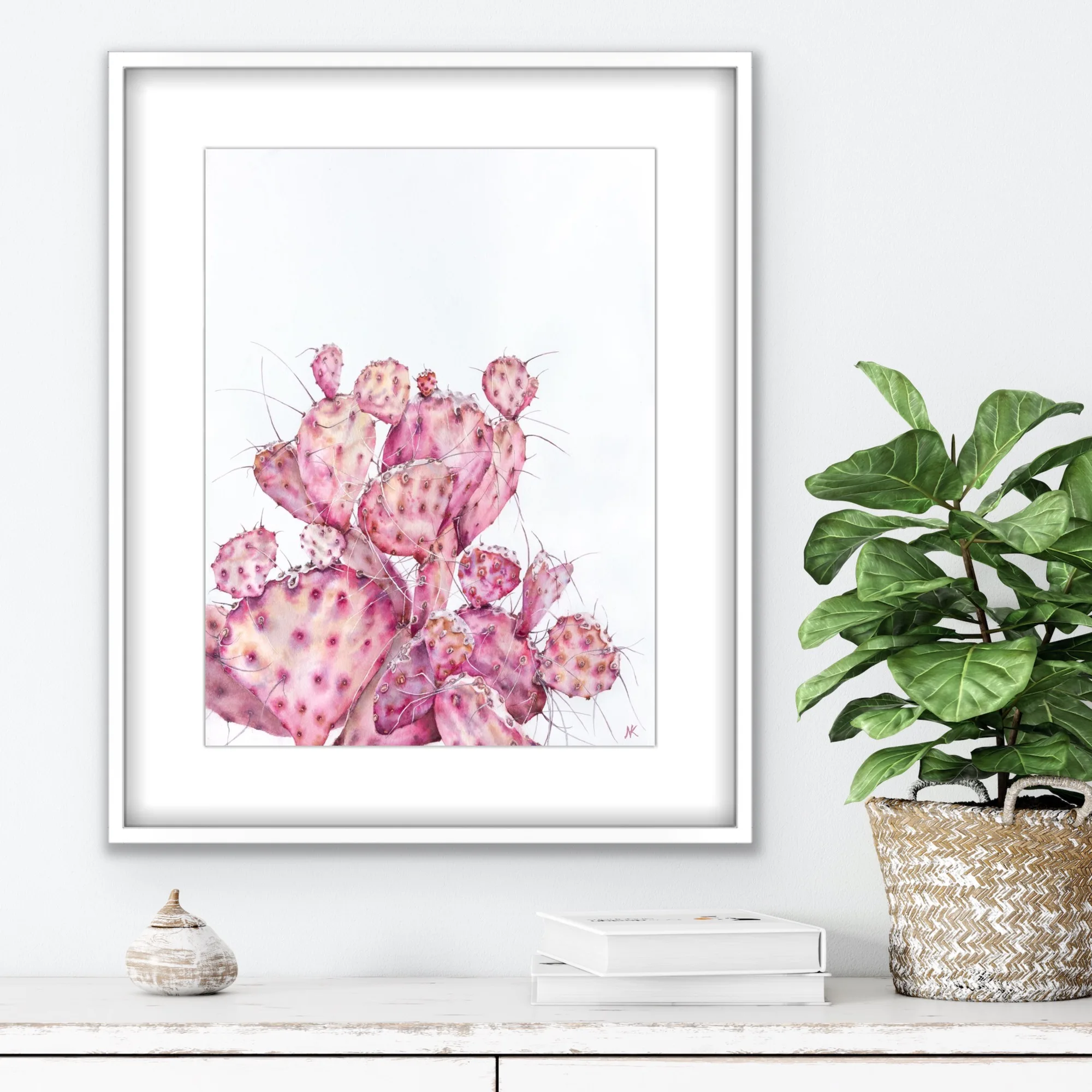 Pink Opuntia cactus watercolor painting framed above a shelf, adding a tranquil and delicate botanical touch to the bedroom with its soft pastel hues and intricate details.