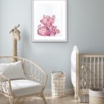 Delicate watercolor of a pink Opuntia cactus hanging in a nursery, adding a soft touch of nature and tranquility to the baby room's serene decor.