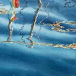 Artist Kateryna Nazarenko’s signature on ‘Morning in the Port,’ subtly placed in the corner of the painting.