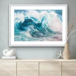 "Fragile but Strong" ocean wave watercolor painting displayed in a coastal home interior, enhancing the space with its serene blue hues and dynamic sea energy.