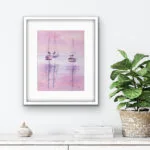 Watercolor painting "Sailboats at Pink Sunset" by Kateryna Nazarenko in a living room setting, enhancing the space with serene colors and elegant reflections of sailboats on water.