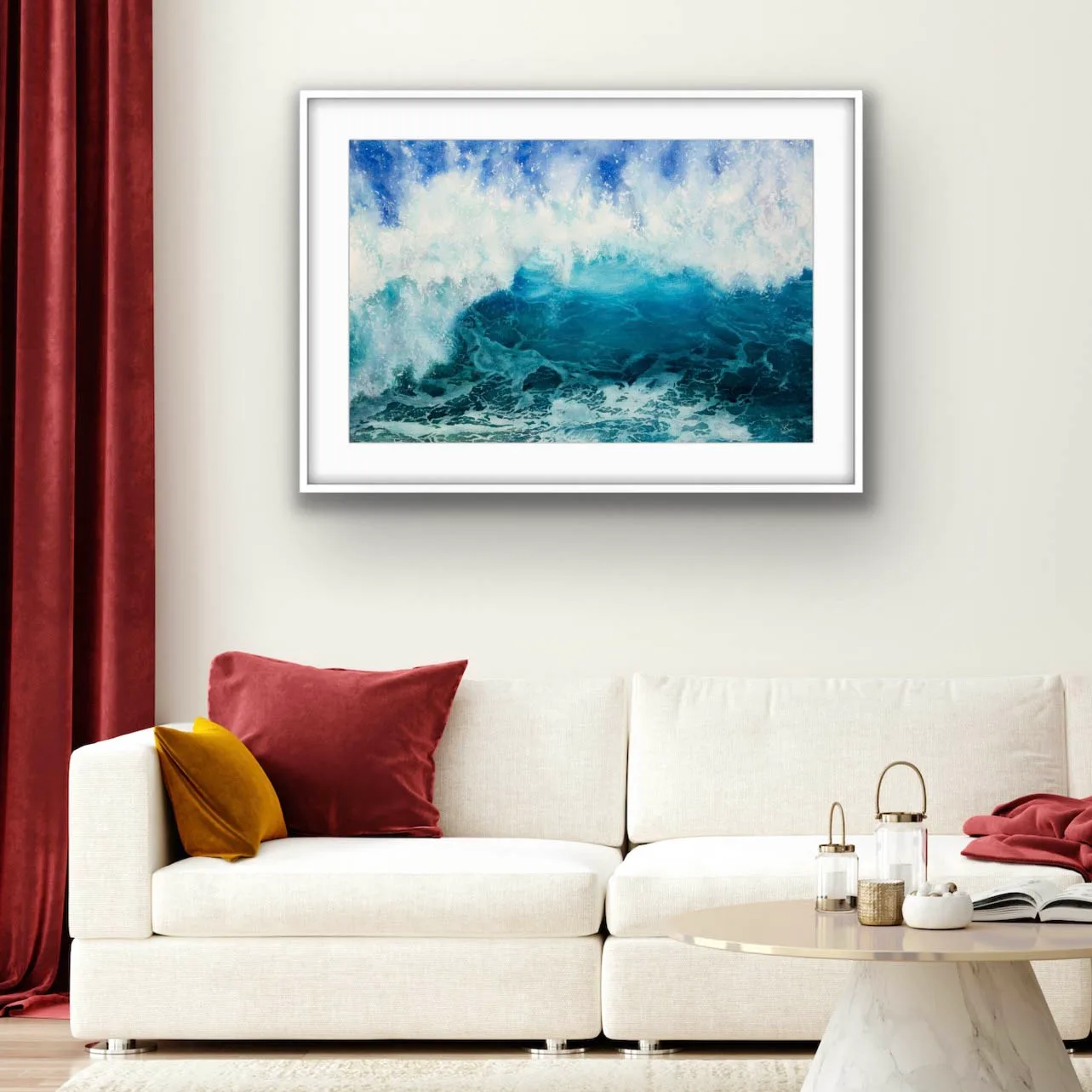 Through the Light’ framed watercolor painting above a sofa in a cozy living room, featuring dynamic waves and ocean motion in vibrant blues and turquoise, complementing the room’s coastal-inspired decor with energy and tranquility.